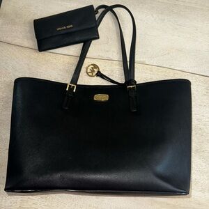 Black Michael Kors tote with matching wallet